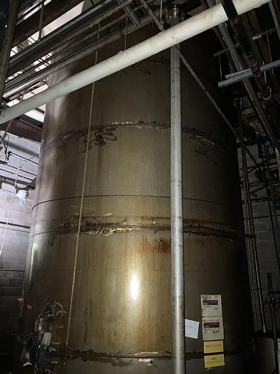 Used Used approximately 11,000 gallon stainless steel vertical tank