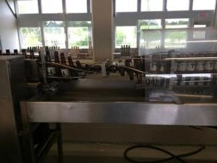 Used Bertolasso 12 Valve Bottling Line