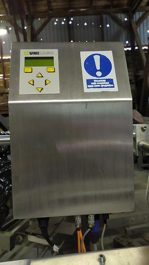 Used Etykieciarka na etykiety samoprzylepne z klejeniem etykiety na opakowaniu od spodu ,,UNILOGO"