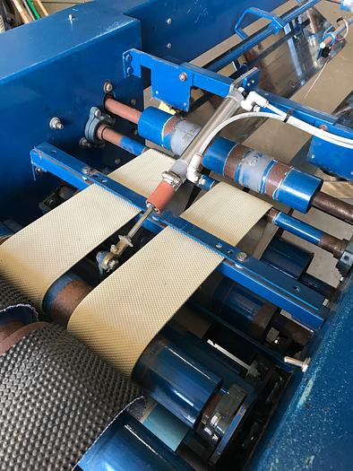 Used 2006 BRAUN REAR DISCHARGE TOWEL/GOWN FOLDER