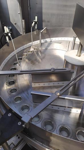 Used Napełniarka karuzelowa - gniazdowa w puszki, słoiki, opakowania plastikowe lub kartonowe firmy "MECOM"