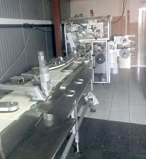 CHOCOLATE WRAPPING MACHINE