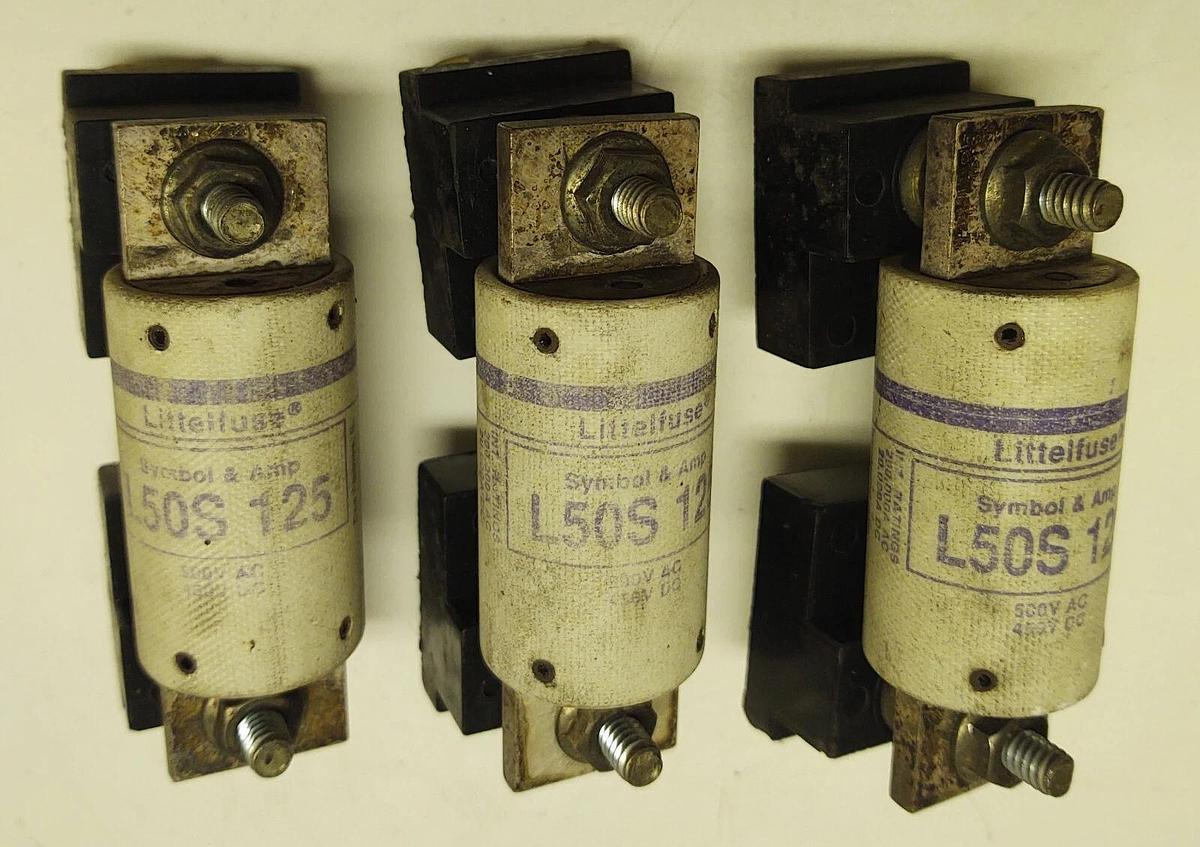 Used (3) LITTLEFUSE L50S-125 500VAC, 450VDC, 125AMP WITH MOUNTING BLOCKS