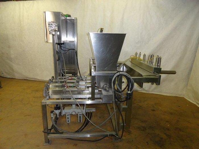 Used FEMC 4 Piston Filler; with (4) dispensing nozzles; Md#3700-000-002