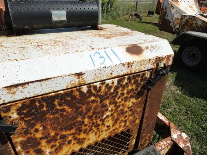 Used 2004 woodchuck WC12A