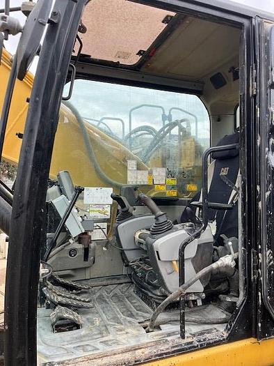 Used DK725 excavator attached