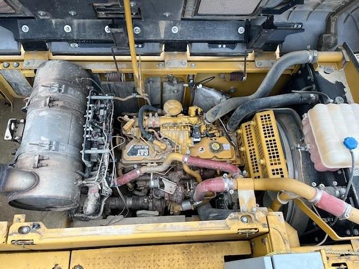 Used DK725 excavator attached