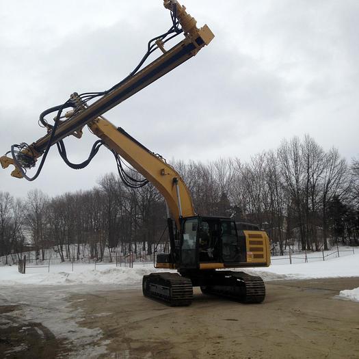 Used DK725 excavator attached
