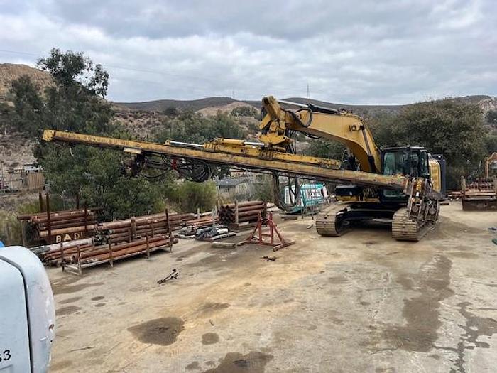 Used DK725 excavator attached