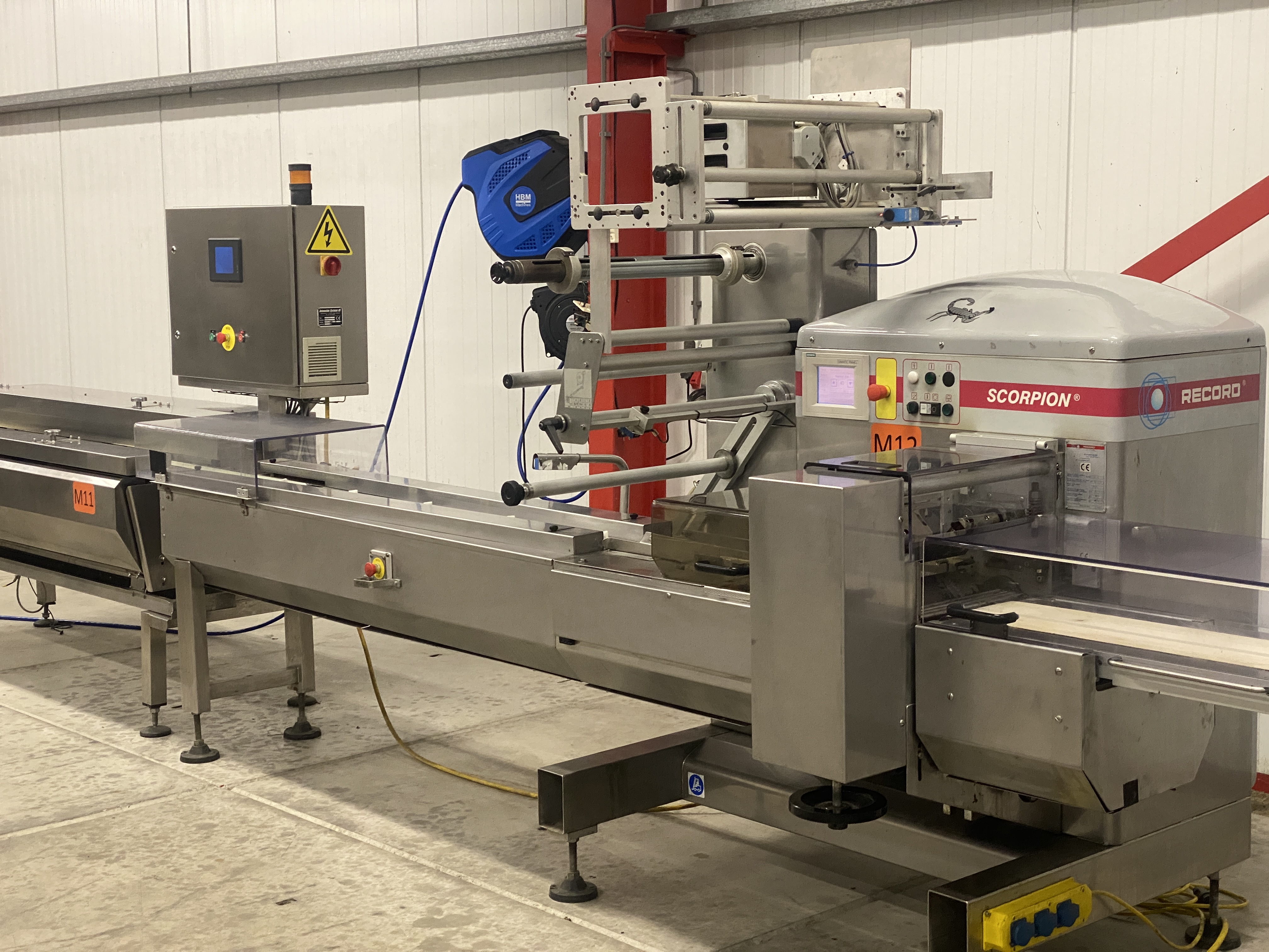 Used Record Scorpion MD flowpacker with Automotion automatic infeed