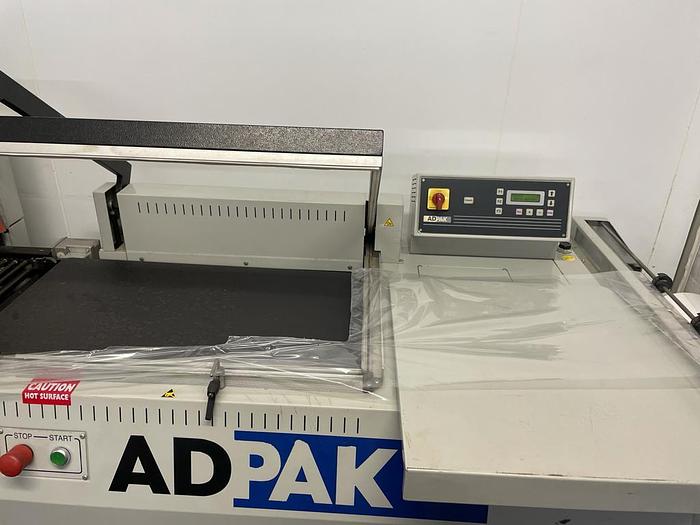 Used 2006 Adpak Smipack FP560A semi-automatic L-sealer and T450 heat tunnel
