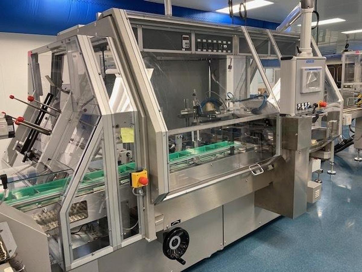 Used CAM Model NCX Tray Former