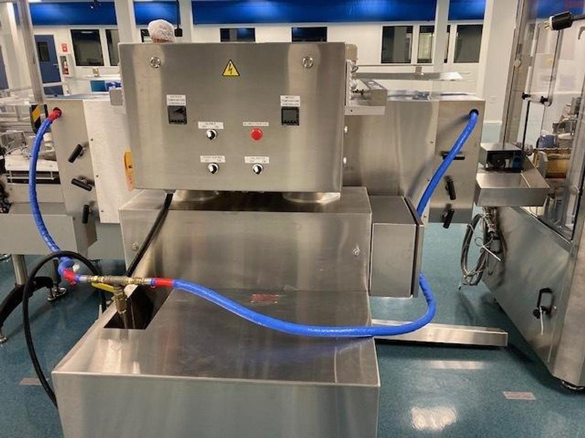 Used Capmatic SleeveStar Full Sleeve Neck Bander