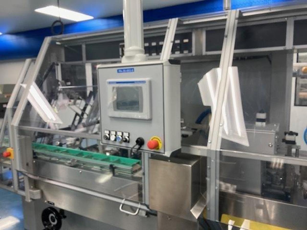 Used CAM Model NCX Tray Former