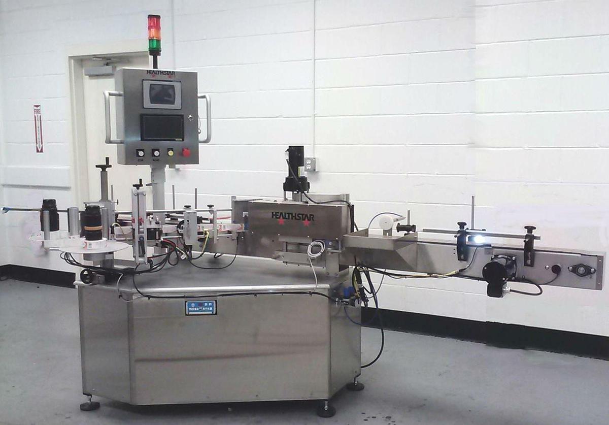 Used HealthStar Pressure Sensitive Labeling Machine