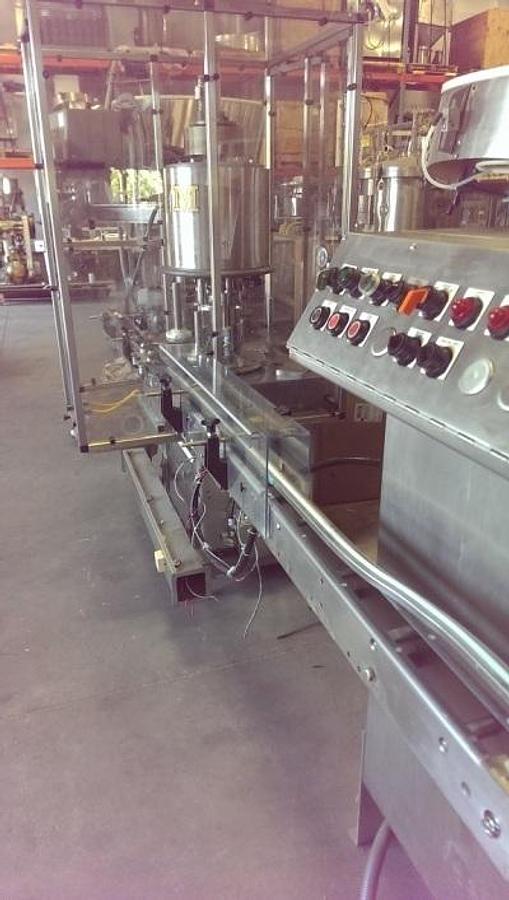 Used Consolidated Packaging Company Model C-4-F Rotary Capper