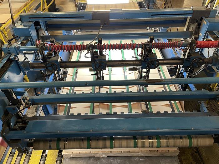 Used 65" JAGENBERG SYNCRO DUAL ROTARY KNIFE SHEETER W/ 4 SHAFTLESS UNWIND STANDS