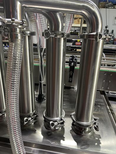 Used FULLY AUTOMATIC PISTON FILLING MACHINE WITH 8 FILLING NOZZLES -READY FOR SHIPMENT