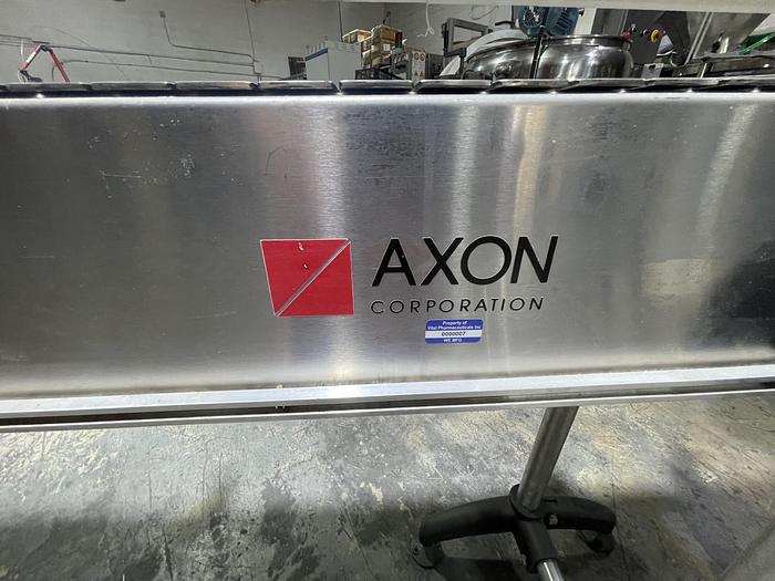 Used STAINLESS STEEL FRAME AND CHAIN-AXON CONVEYOR 15 FEET LONG 7.5 INCHES WIDE AND READY FOR SHIPMENT