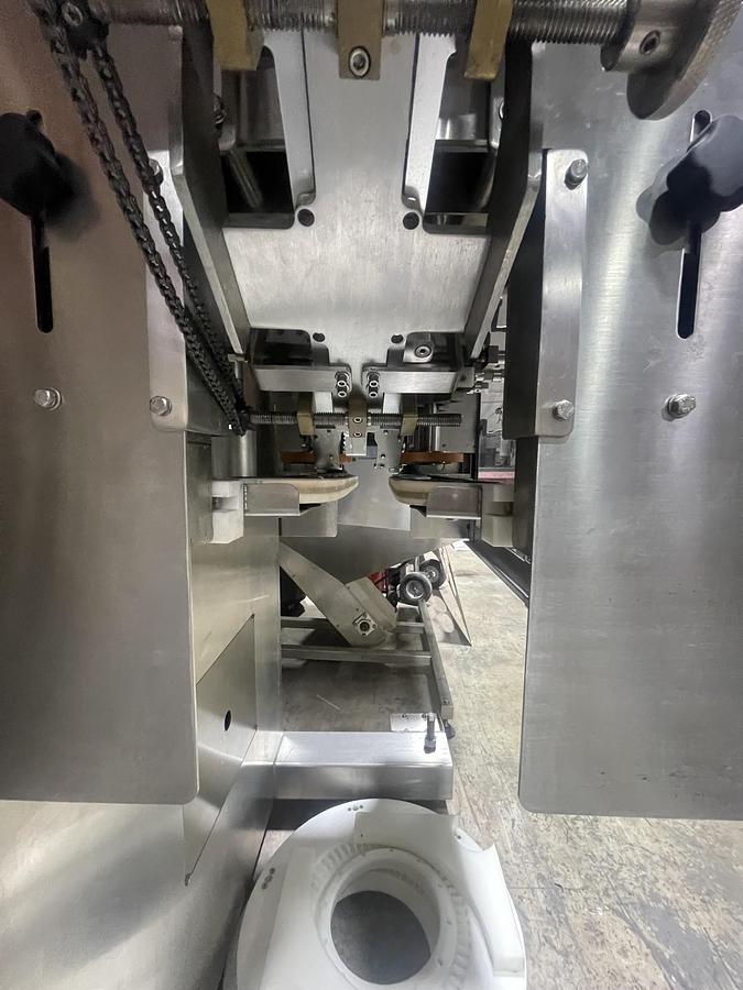 Used AUTOMATIC INLINE BOTTLE CAPPING MACHINE WITH VERTICAL WHEEL CAP SORTER