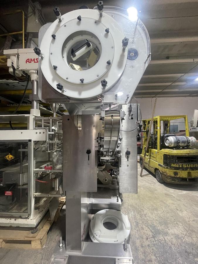 Used AUTOMATIC INLINE BOTTLE CAPPING MACHINE WITH VERTICAL WHEEL CAP SORTER