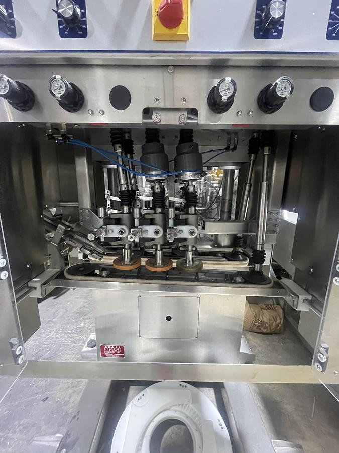 Used AUTOMATIC INLINE BOTTLE CAPPING MACHINE WITH VERTICAL WHEEL CAP SORTER