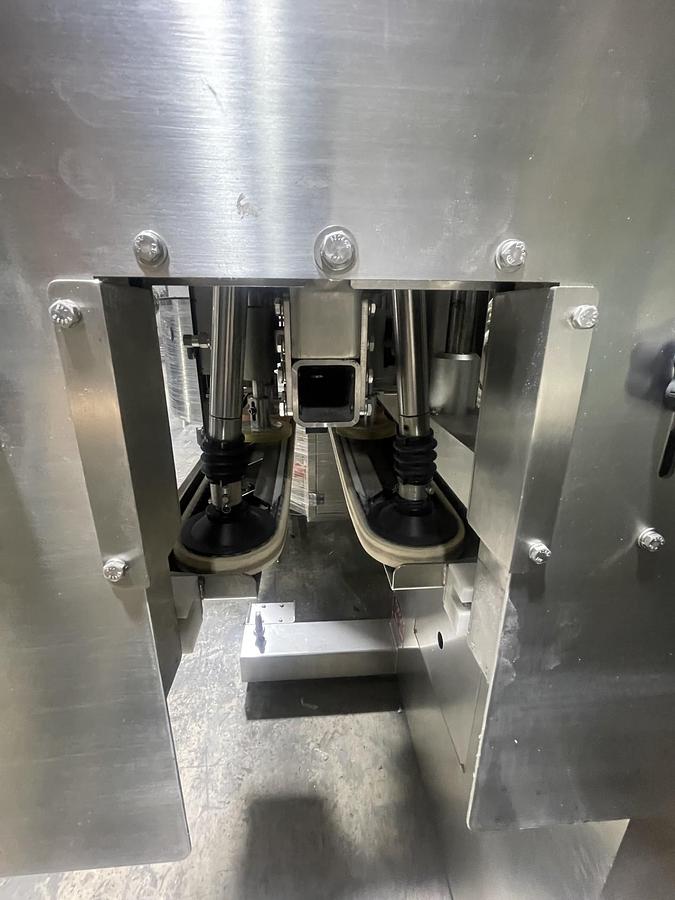 Used AUTOMATIC INLINE BOTTLE CAPPING MACHINE WITH VERTICAL WHEEL CAP SORTER