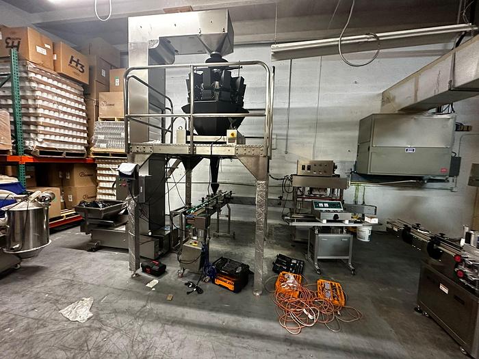 FULLY AUTOMATIC GUMMIES AND SIMILAR PRODUCTS FILLING MACHINE