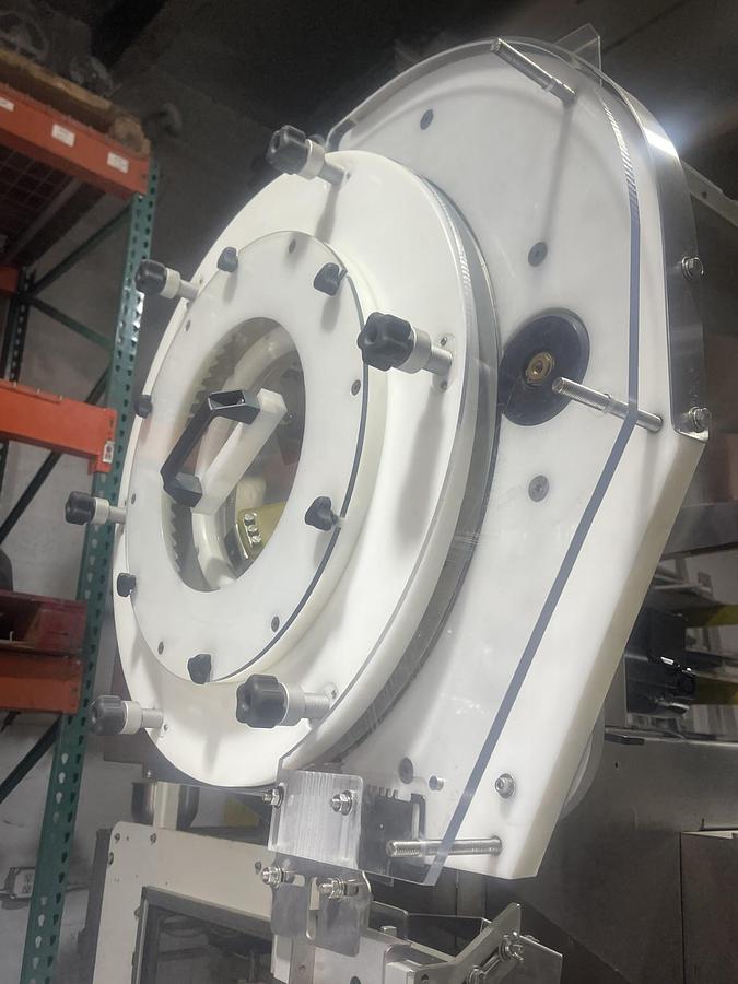 Used AUTOMATIC INLINE BOTTLE CAPPING MACHINE WITH VERTICAL WHEEL CAP SORTER