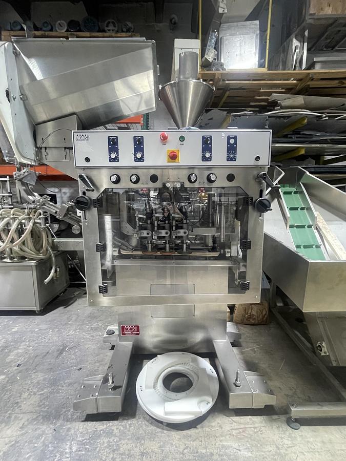 Used AUTOMATIC INLINE BOTTLE CAPPING MACHINE WITH VERTICAL WHEEL CAP SORTER