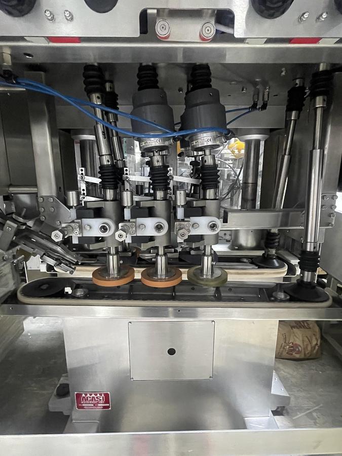 Used AUTOMATIC INLINE BOTTLE CAPPING MACHINE WITH VERTICAL WHEEL CAP SORTER