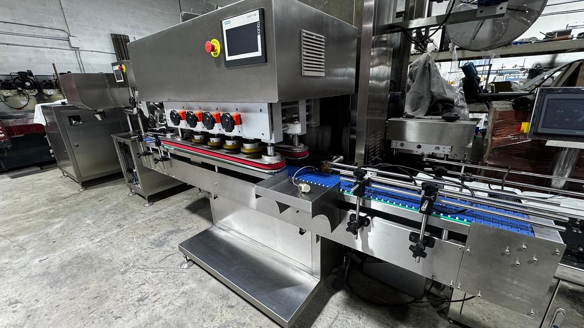 Used Automatic Counting and Dispensing Capsules and Tables Machine, Unscrambler, Adjustable Capping Machine, Induction Sealer, Bottomless Conveyor, Labeling Machine, Neck Bander/Full Sleeve Applicator w/ Heat Tunnel, Accumulation Rotary Table-READY FOR SHIPMENT