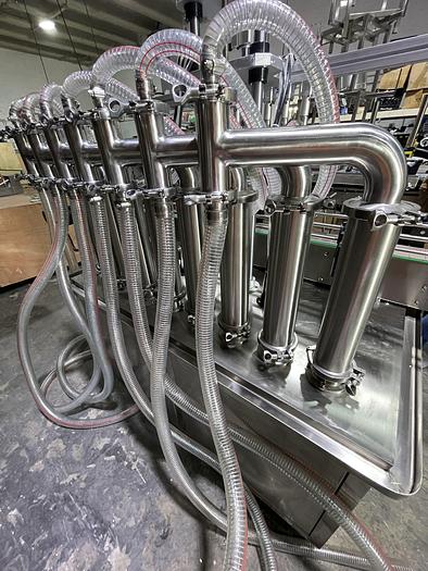 Used FULLY AUTOMATIC PISTON FILLING MACHINE WITH 8 FILLING NOZZLES -READY FOR SHIPMENT