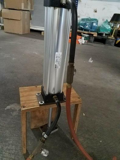 Used Schrader Bellows Eco Ram II Cylinder mounted on platform