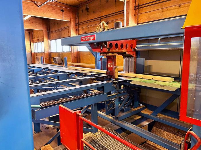 Used Hundegger K2-4 BHF joinery line  for log house production