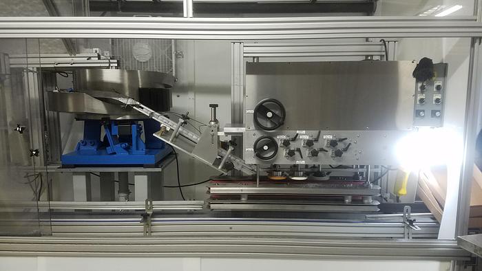 Used EQUIPMENT EXPRESS BOTTLING LINE (FILLER AND CAPPER)