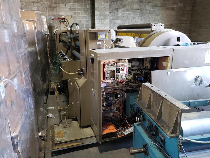 Used 56" WIDE PCMC TURRET REWIND WITH SLITTING