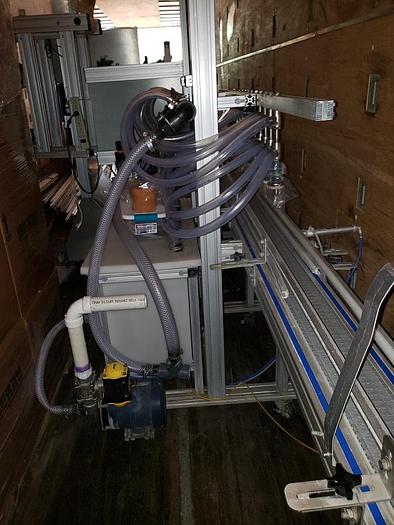 Used EQUIPMENT EXPRESS BOTTLING LINE (FILLER AND CAPPER)