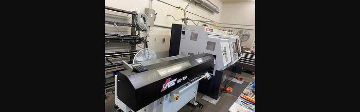 Used Used 2010 Mazak QTN 100MSY Multi-Tasking CNC Lathe with ATSML-565 Barfeed