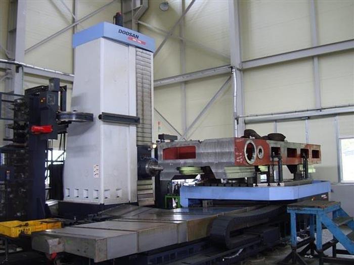 Used Used 2012 Doosan DBC-130L 5.1″ Bar Table Type CNC HBM