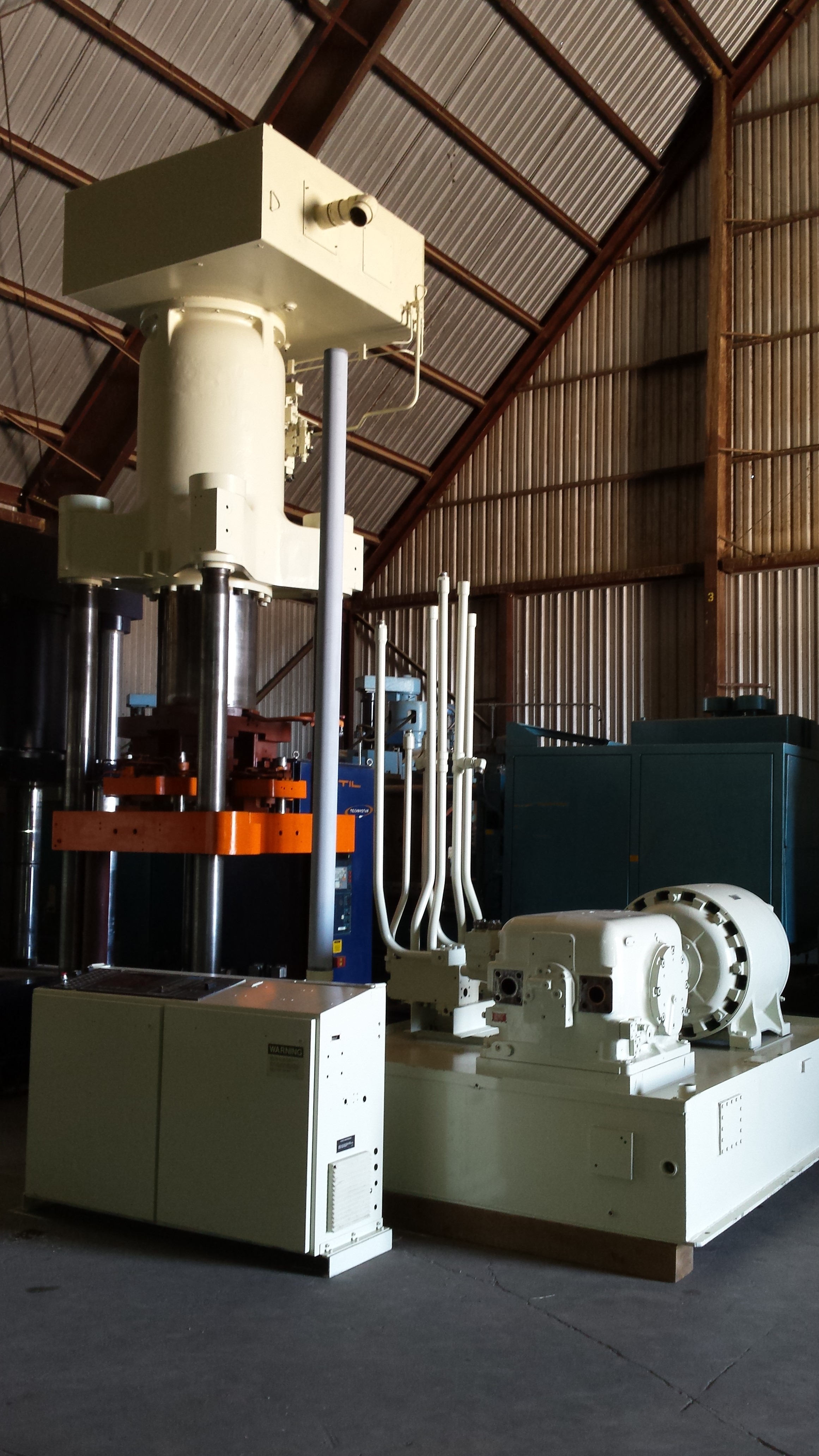 Used 550 Ton Cincinnati Triple Action Hydraulic Press; 4 Column Down-Acting Type; Arranged for High Speed Deep Drawing; Mfg. 1989