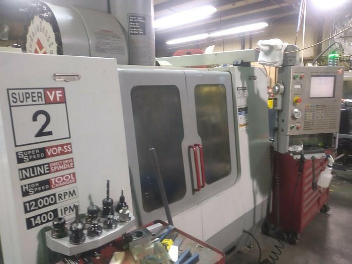 Used 2004 HAAS VF-2 4-Axis CNC Vertical Machining Center
