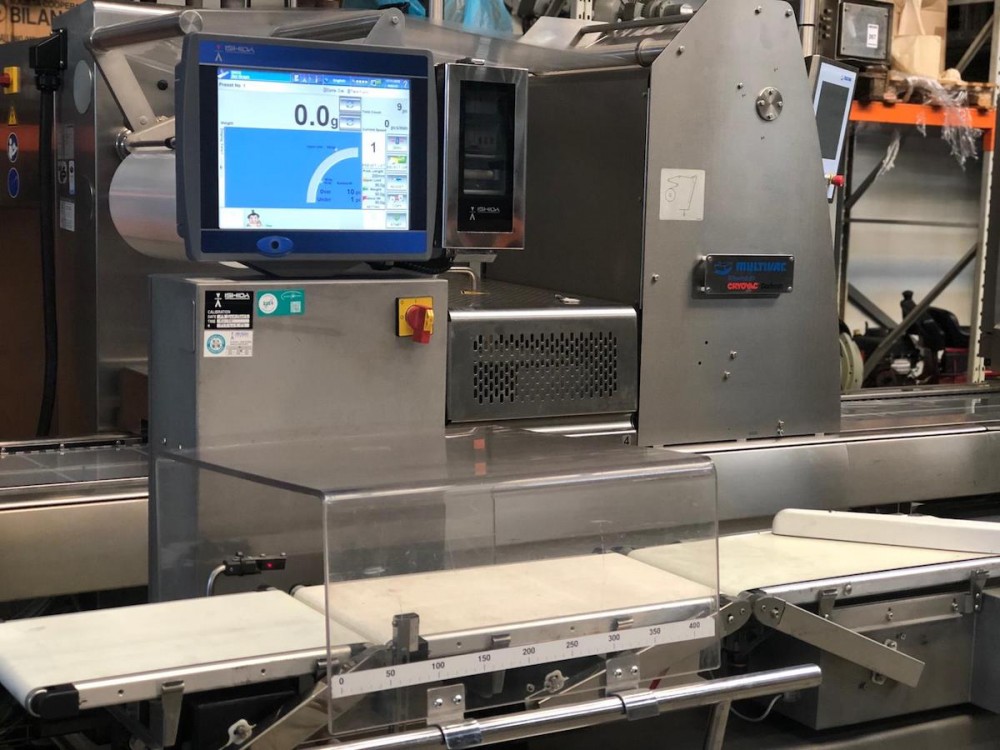 Used Ishida checkweigher with automatic reject