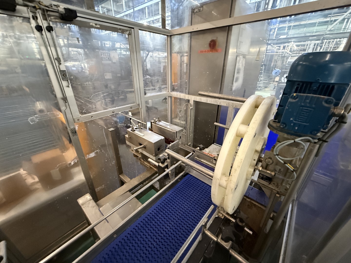 Used Filling, closing, labelling and packing line for plastic containers of 2 liter with fresh milk - Weightpack WFT 32.10.160