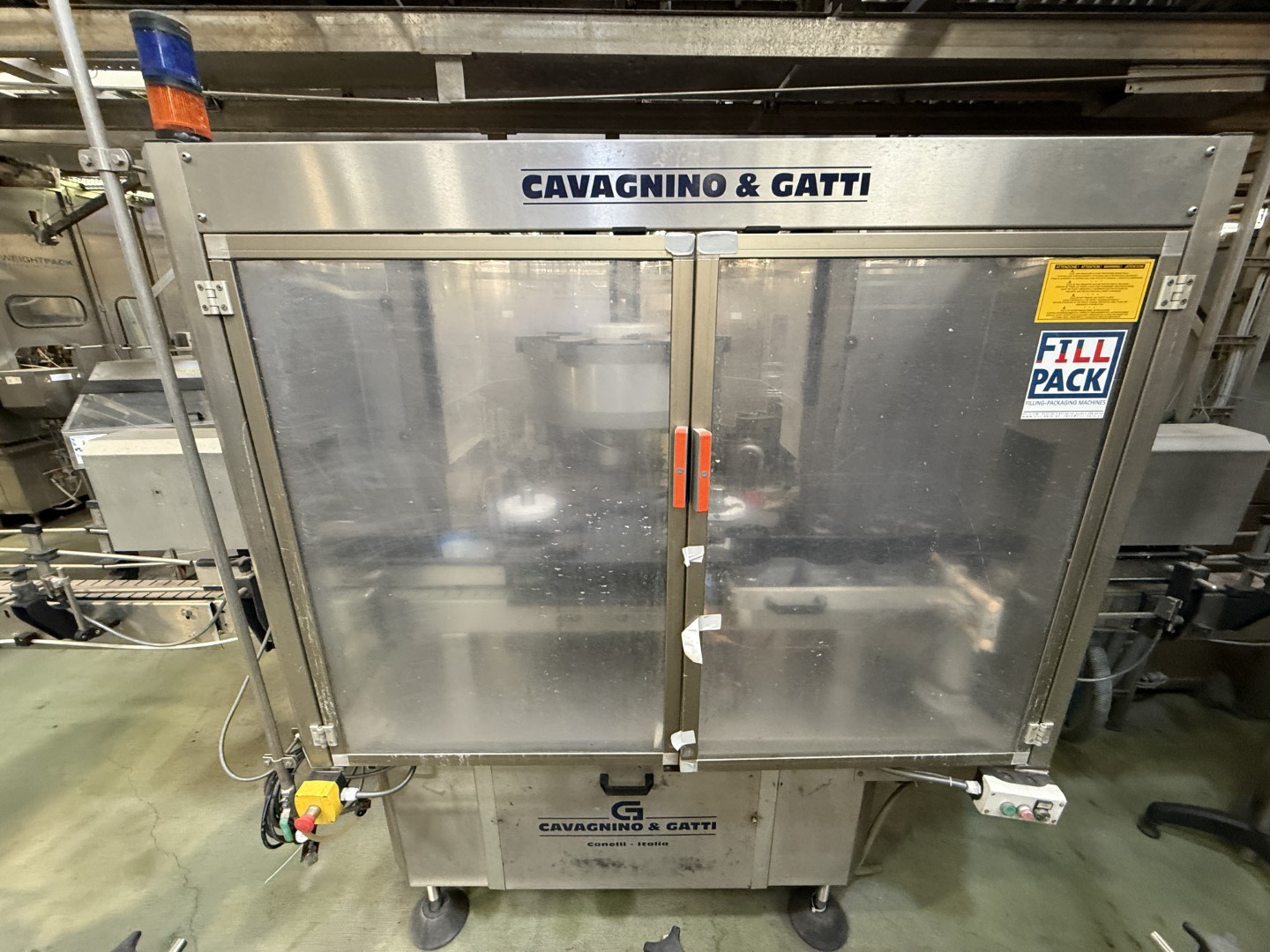 Used Filling, closing, labelling and packing line for plastic containers of 2 liter with fresh milk - Weightpack WFT 32.10.160