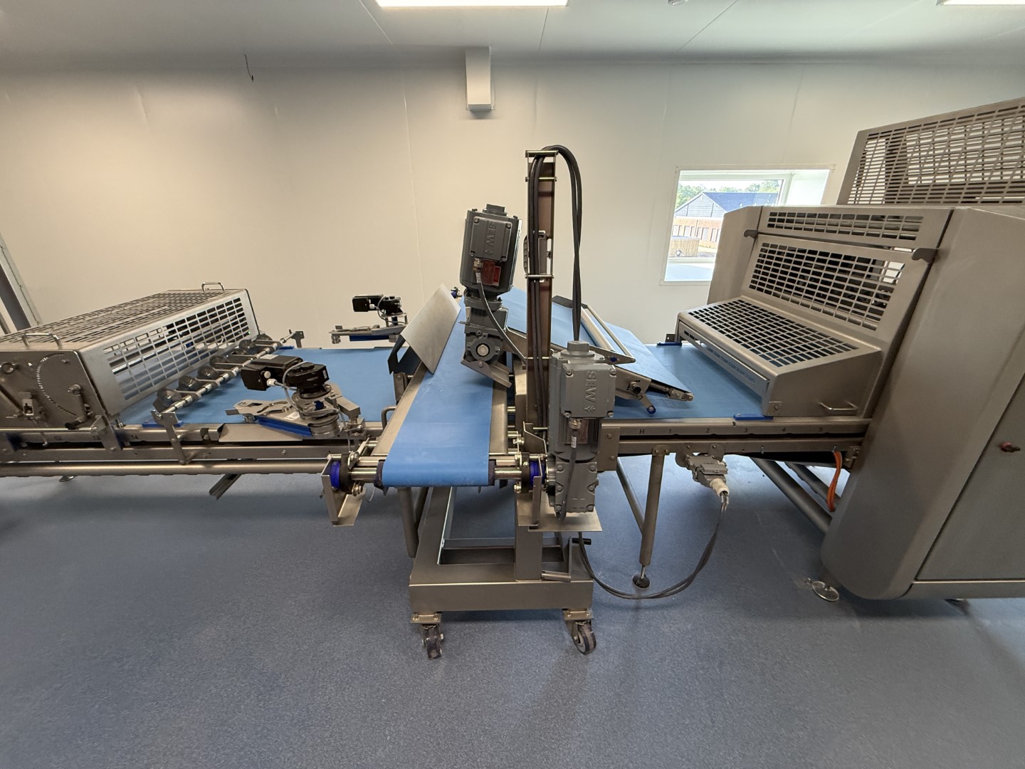 Used Dough processing / rollout line - Rademaker sheeting line with universal line and Packo nitrogen freezer