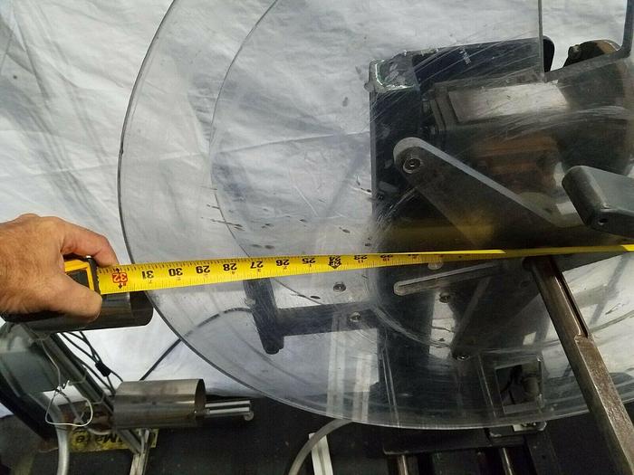 Used Rapid Motorized Double Sided Stock Reel Material Feed with control panel