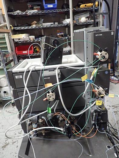 Used (2) GE AKTA Purifier FPLC Systems w/ Box-900 UPC-900 UV-900 P-900 FRAC-920 M-925