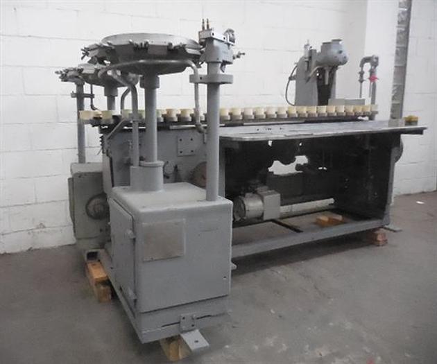 Used Arenco semiautomatic tube filler.