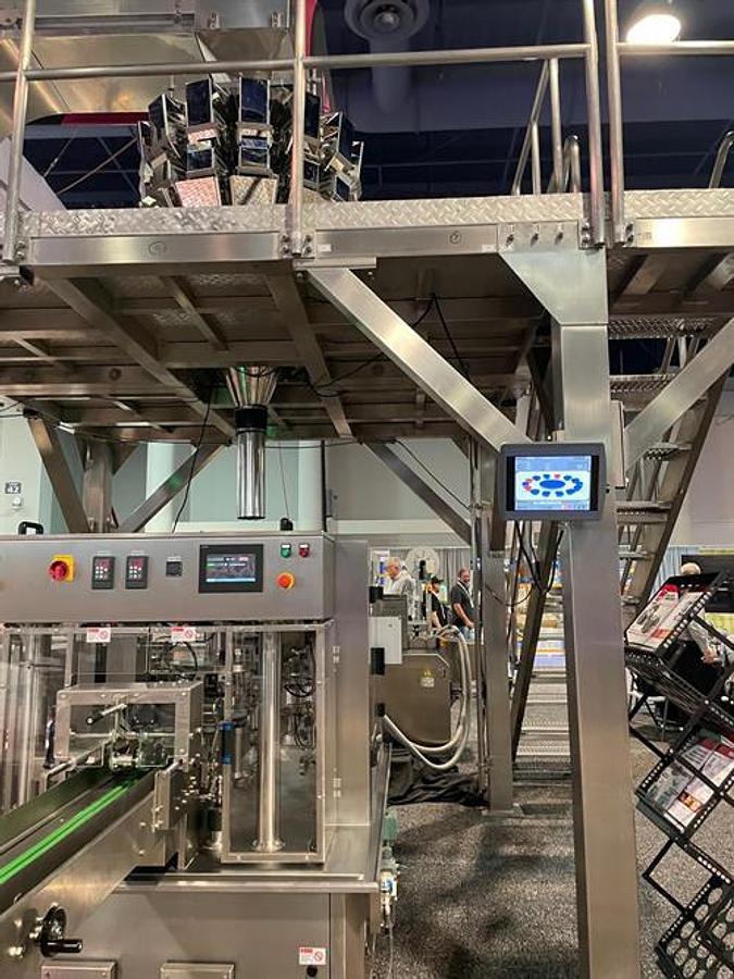 Used New Genesis Rotary Pre-Made Pouch Machine with 14-Head Scale